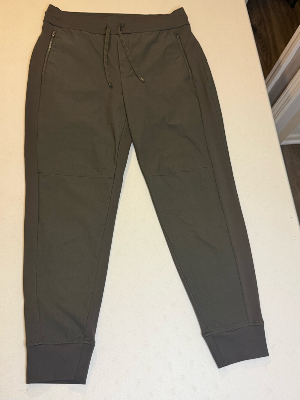 Athleta Women 12 Brooklyn Jogger Pants Olive Green Lightweight Travel Zip Pocket